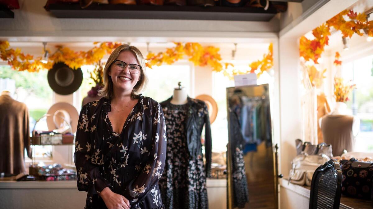 Lauren Bertolani began working at Moth Hole Consignment Boutique, which opened in Orangevale in the 1970s, when she was 16 years old and continued through college. She bought the shop with her husband six years ago, and since then has expanded and eventually relocated the small business to its current location in Fair Oaks. She is seen Thursday, Oct. 21, 2021.