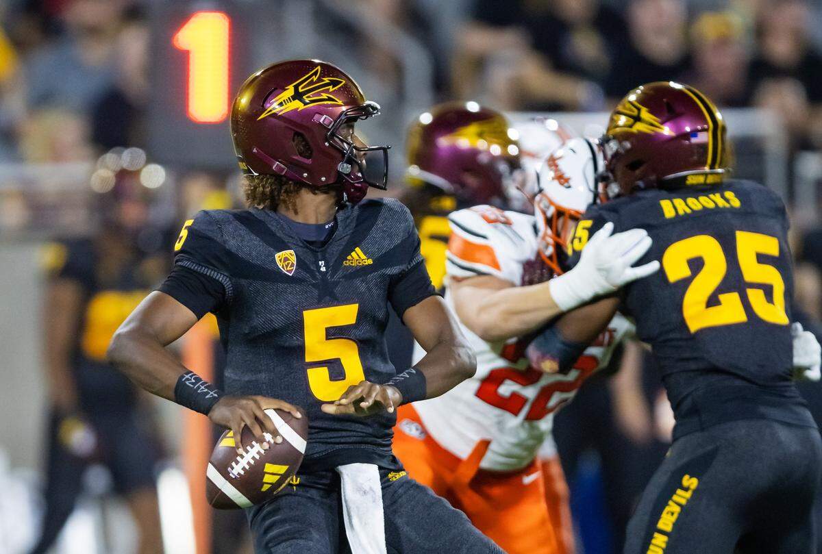 Sep 9, 2023; Tempe, Arizona, USA; Arizona State Sun Devils quarterback Jaden Rashada (5) against the Oklahoma State Cowboys in the first half at Mountain America Stadium. Mandatory Credit: Mark J. Rebilas-USA TODAY Sports