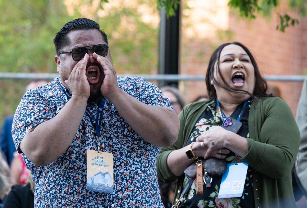 Protesters chant during UC Davis chancellor Gary May’s speech before the ribbon cutting ceremony at Aggie Square in Sacramento on Friday.