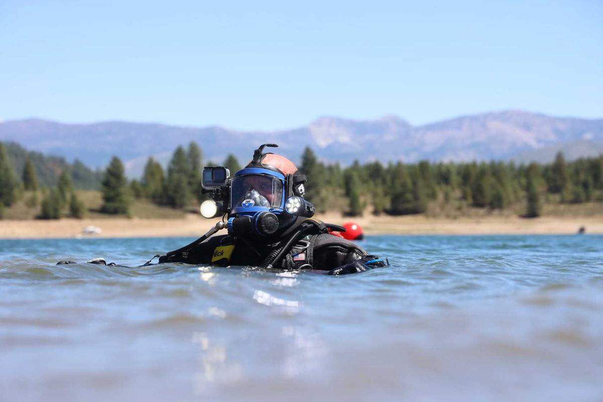 Nick Rinn of Adventure with Purpose works in the water to find Kiely Rodni’s vehicle, which was located submerged in Prosser Creek Reservoir on Sunday, Aug. 21, 2022 near Truckee, Calif. The Oregon-based diving team located the SUV and a body believed to be that of missing teen Kiely Rodni.