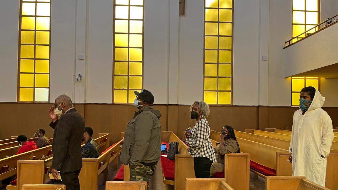 People line up to speak during a reparations task force meeting at Third Baptist Church in San Francisco, Wednesday, April 13, 2022. California’s first-in-the-nation reparations task force met for the first time since its inaugural meeting nearly a year ago. The live meeting also comes mere weeks after the group voted to limit restitution to descendants of enslaved or free Black people in the U.S. before the 20th century. (AP Photo/Janie Har)