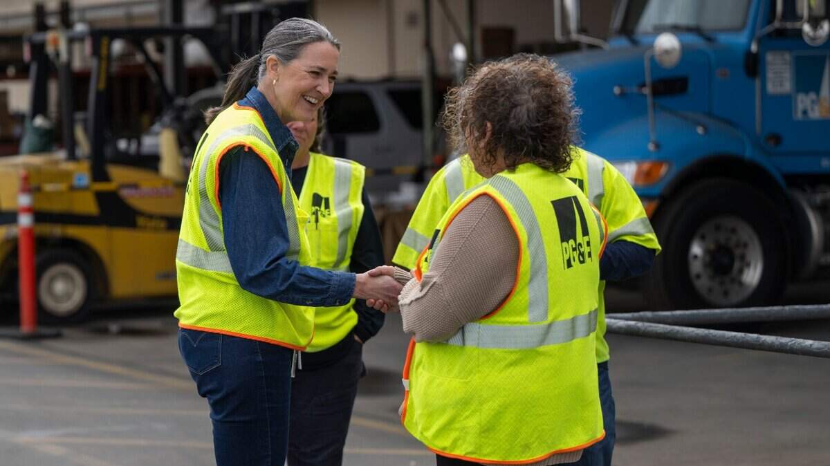 PG&E CEO Patti Poppe speaks with workers at a Sacramento area facility. California needs strict federal oversight of PG&E.