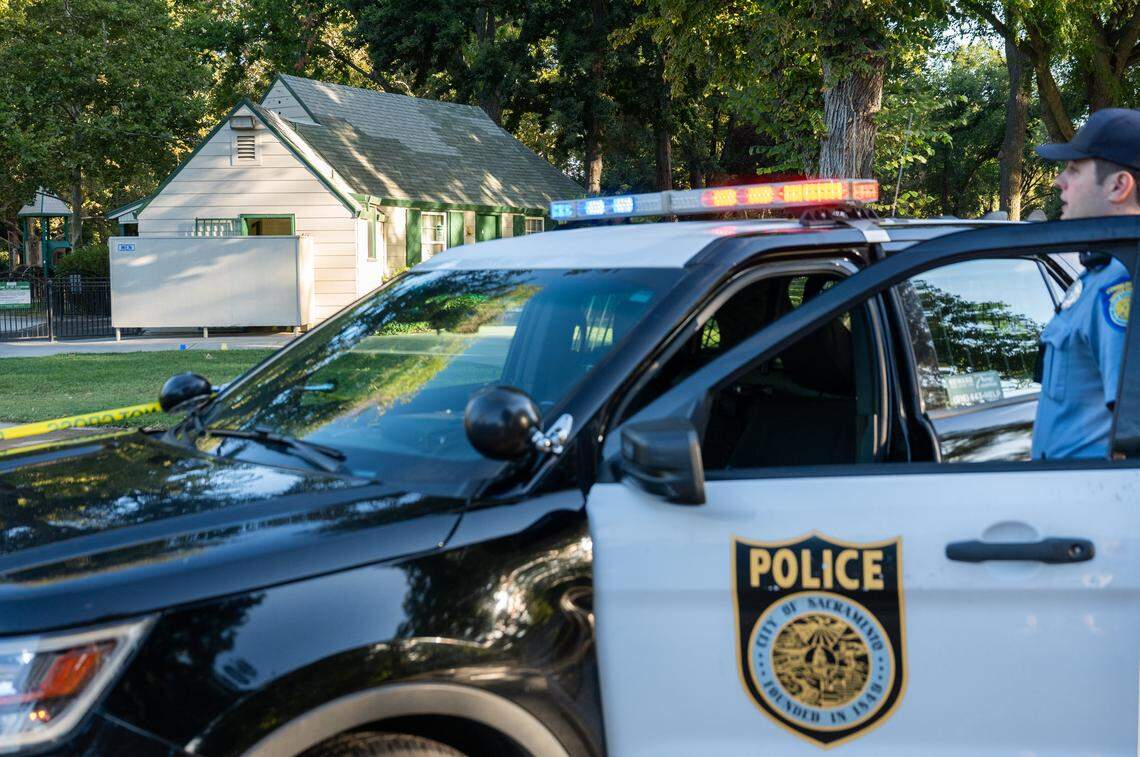 Evidence tags remain outside a men’s restroom in William Land Park as Sacramento police officers investigate a shooting scene on Thursday, Aug. 14, 2025.