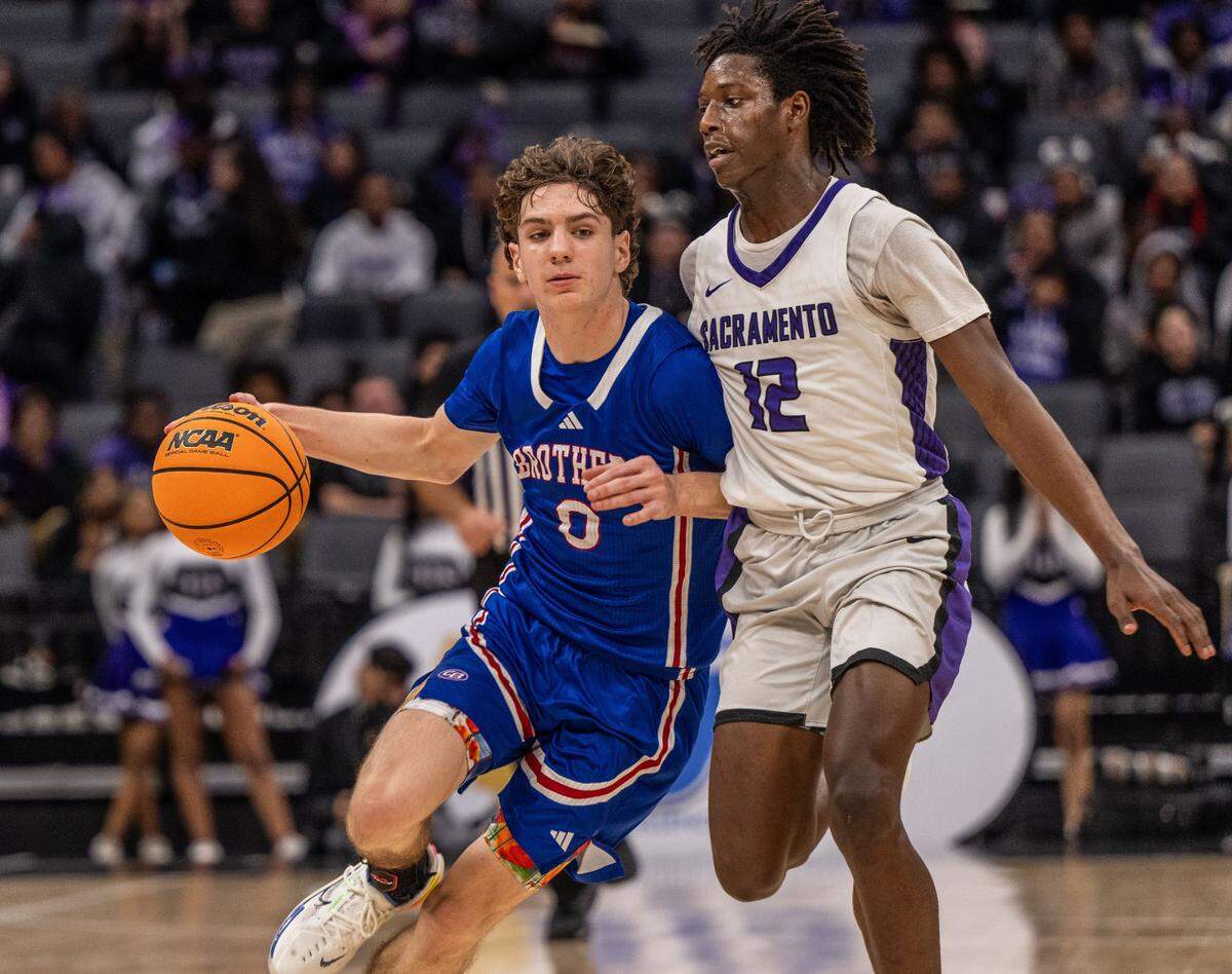 Christian Brothers Falcons’ Daniel Powers, seen driving to the basket against the Sacramento Dragons during the CIF Sac-Joaquin Section Division III boys basketball section championship game in 2024 at Golden 1 Center, is The Sacramento Bee’s Medium School Player of the Year for 2024-25.