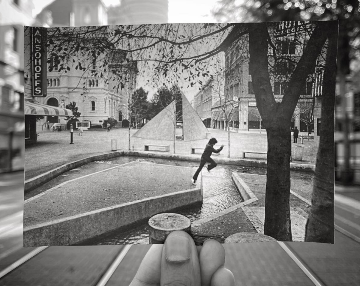 A boy jumps between demolished fountains on K Street in a historic Sacramento Bee photograph, accessed from the collection at the Center for Sacramento History, that Zaved Khan juxtaposed in a photograph of the light rail tracks that now exist at the location.