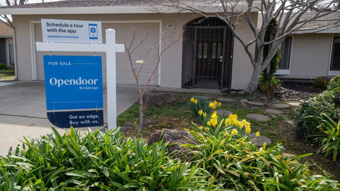 A sign for the Opendoor online brokerage firm sign advertises a home for sale on Elmira Circle in La Riviera neighborhood, west of outside of Rancho Cordova, on Monday, Feb. 20, 2023. Opendoor is the last remaining iBuyer – or instant buyer – operating in the Sacramento area. 
