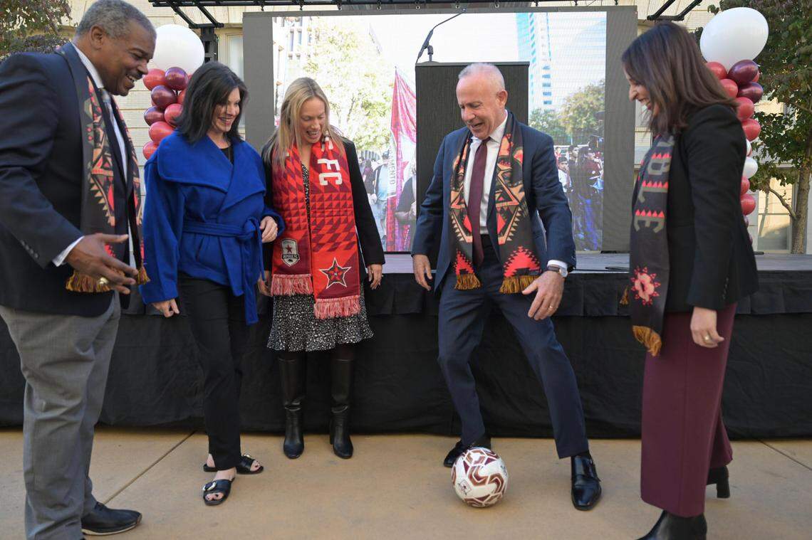 Sacramento Mayor Darrell Steinberg, whose term ends next month, works to impart some soccer skills on other City Council members before a press conference on Thursday about plans for the construction of a new, state-of-the-art soccer stadium in the downtown Railyards.
