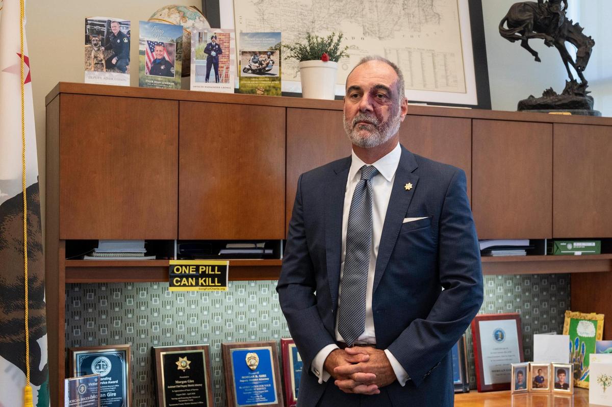 Placer County District Attorney Morgan Gire stands in his office Monday at the Santucci Justice Center in Roseville. He and other district attorneys are pursuing murder charges against people who sell or provide drugs with lethal doses of fentanyl to someone who later dies from taking them.
