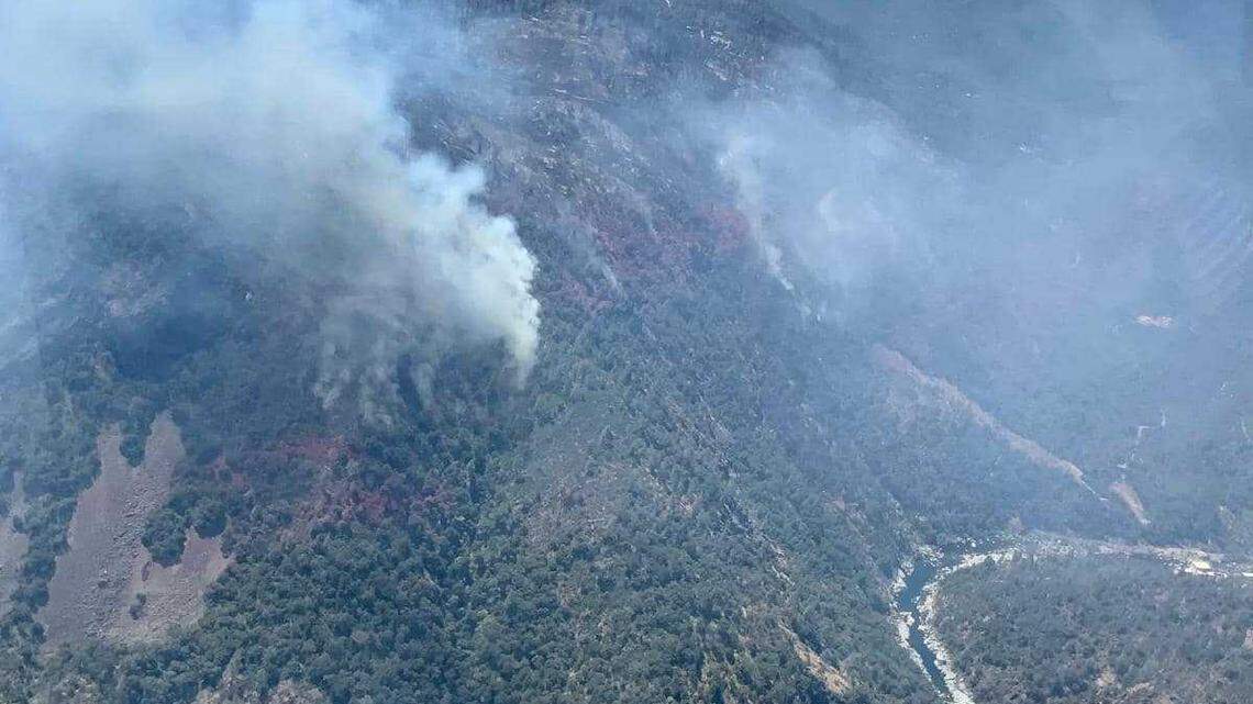The Rices Fire is seen above the Yuba River in Nevada County, Calif., on Wednesday, June 29, 2022. Firefighters had stopped forward progress blaze Thursday morning.