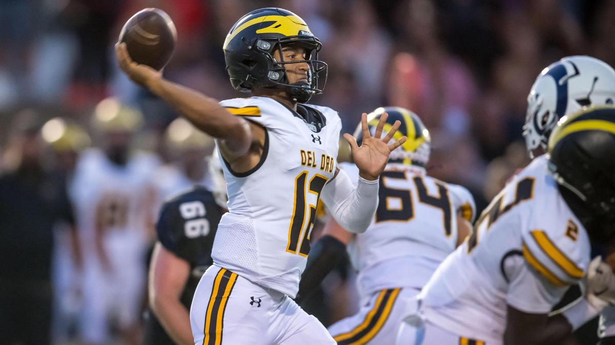 Former Del Oro Golden Eagles quarterback Caden Pinnick throws a completion against the Casa Roble Ramsin 2023. Pinnick has been named the UC Davis starting quarterback.