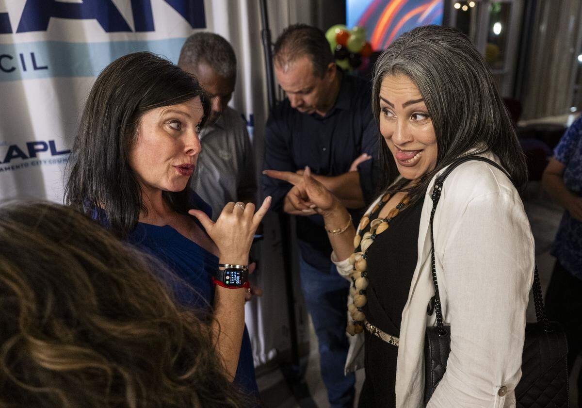 Sacramento City Councilmember Lisa Kaplan speaks to supporter Reina Lisbet Tarango during her election night party at the Aloft Hotel in Natomas on Tuesda.