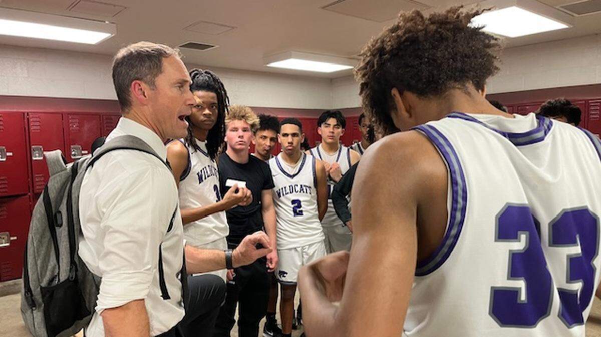 Franklin High School boys basketball coach Ken Manfredi talks to his team after beating Folsom in a CIF Sac-Joaquin Section Division I playoff game in Elk Grove.