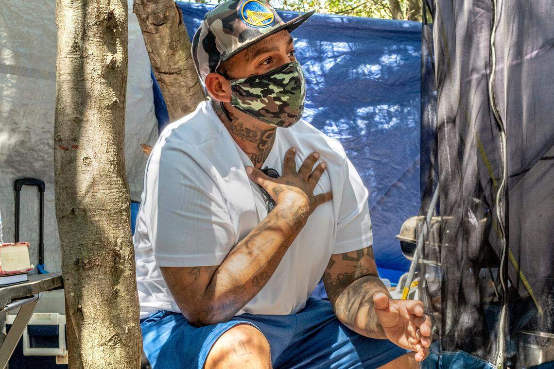 Homeless camper Joseph de la Cruz explains the impact of having to move from his encampment in Elk Grove. Suffering from COVID, he said he left his former life as a gang member and drug addict and is ready to work and help rehabilitate other gang members.