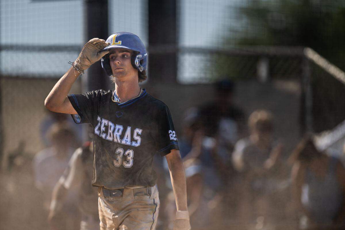 Rocco Pipia, (33) reacts to being tagged out at home plate by Oakmont High School in a CIF Sac-Joaquin Section Division lII baseball semifinal playoff game on Monday, May 13, 2024, at Oakmont High School in Roseville. Pipia is now a senior for the Lincoln Flying Zebras as they compete in 2025 for a section title.
