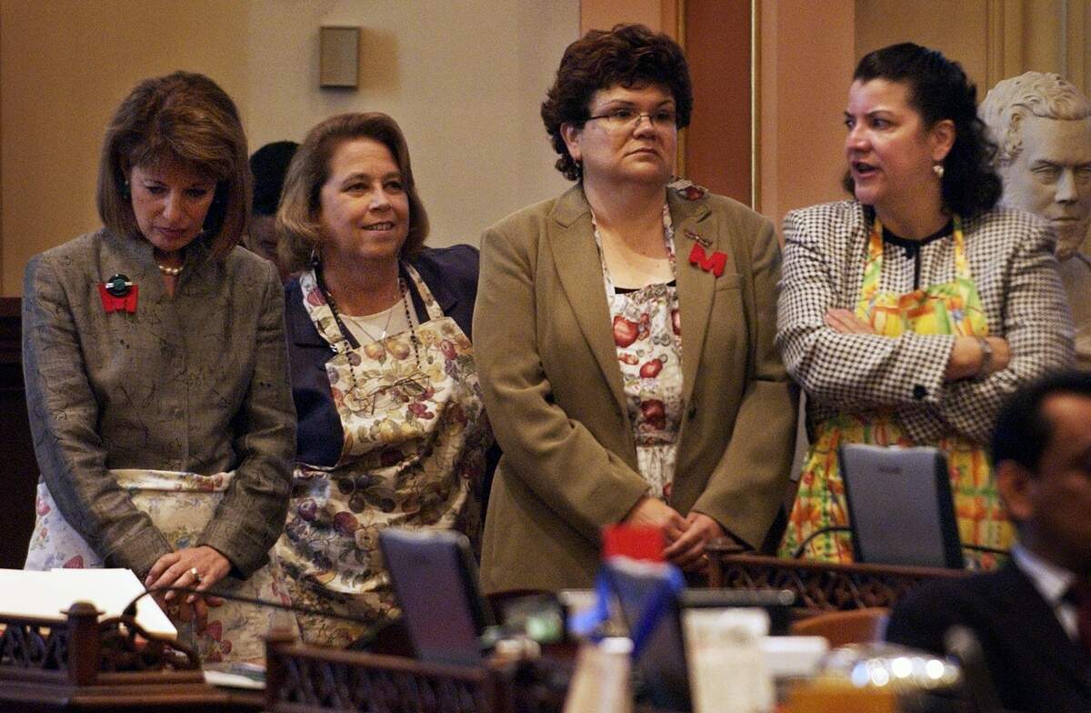 From left, state Sens. Jackie Speier, D-Hillsborough, Denise Ducheny, D-San Diego, Martha Escutia, D-Whittier, and Deborah Ortiz, D- Sacramento, dress in aprons as a protest at the Capitol on Monday, May 24, 2004, about evangelical minister Ralph Drollinger’s April 26 bible study lesson, which he does for Capitol lawmakers and staff. He concluded the April 26 lesson by saying that it is sinful to be away in Sacramento four days a week while your kids are at home in another city - if you’re a woman.