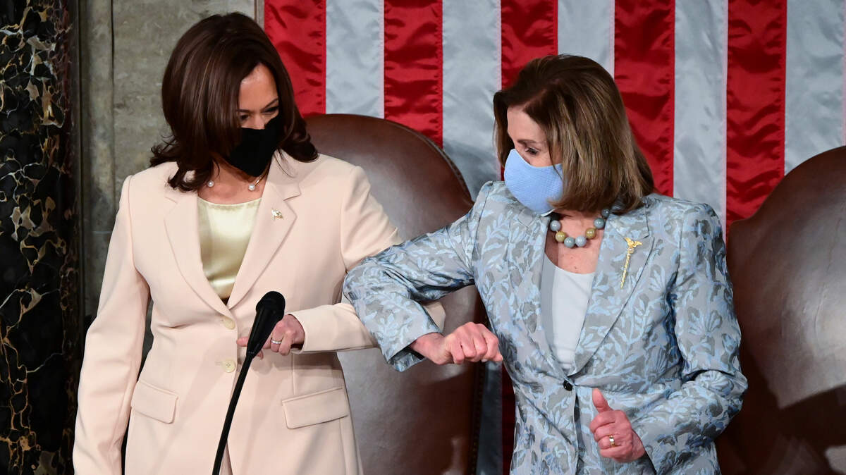 Vice President Kamala Harris, left, greets House Speaker Nancy Pelosi ahead of President Joe Biden’s address to a joint session of Congress in April.
