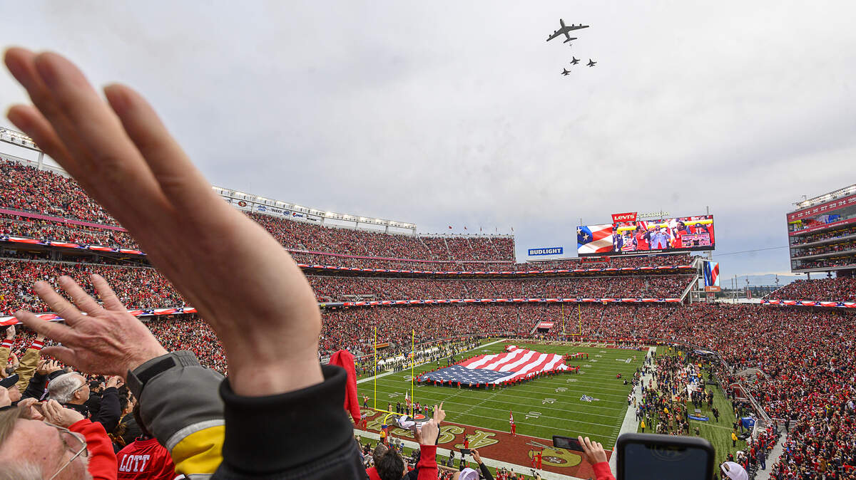 San Francisco 49ers fans watch the pregame ceremonies – including a flyover by the 416th Flight Test Squadron from Edwards Air Force Base – before the NFC Championship game at Levi’s Stadium on Sunday, Jan. 19, 2020 in Santa Clara.