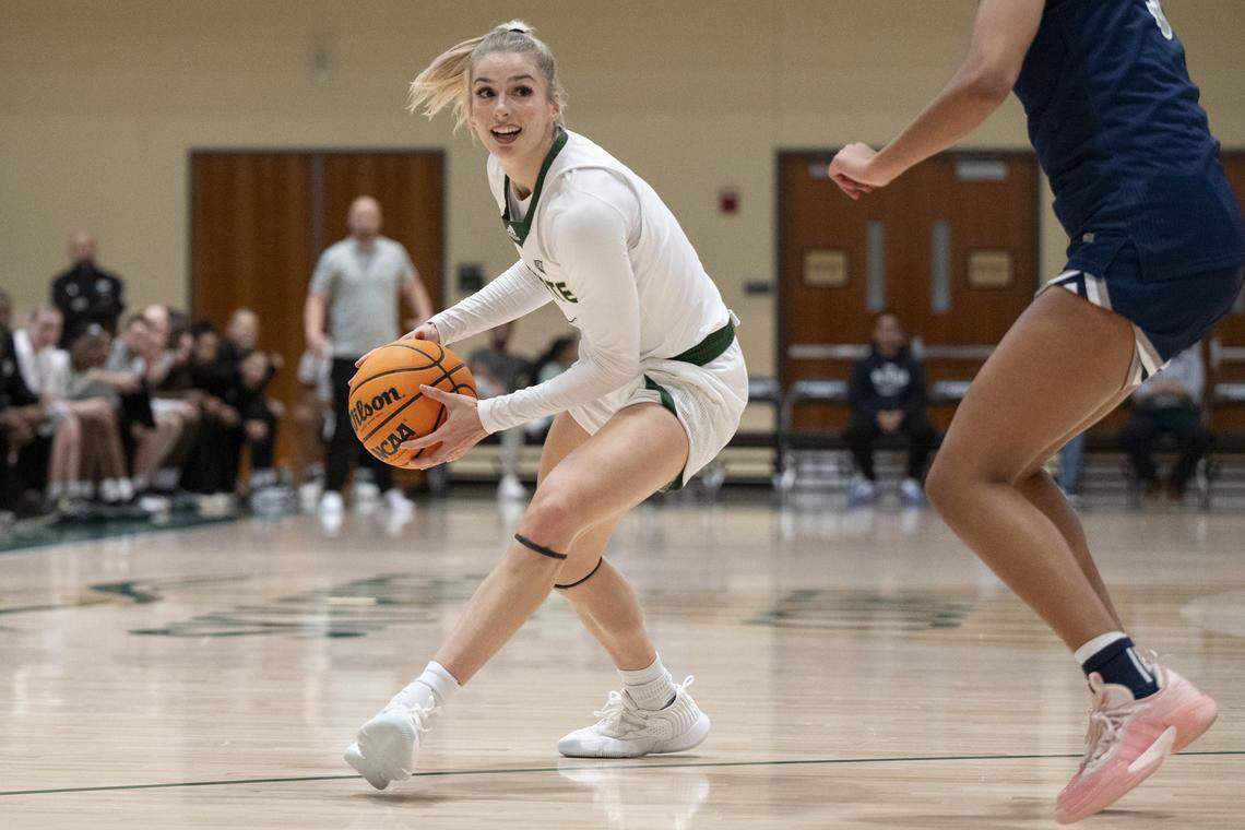 Sacramento State guard Benthe Versteeg (1) keeps the ball away from the defense during a game against Nevada at Hornet Pavilion in Sacramento on Nov. 6.