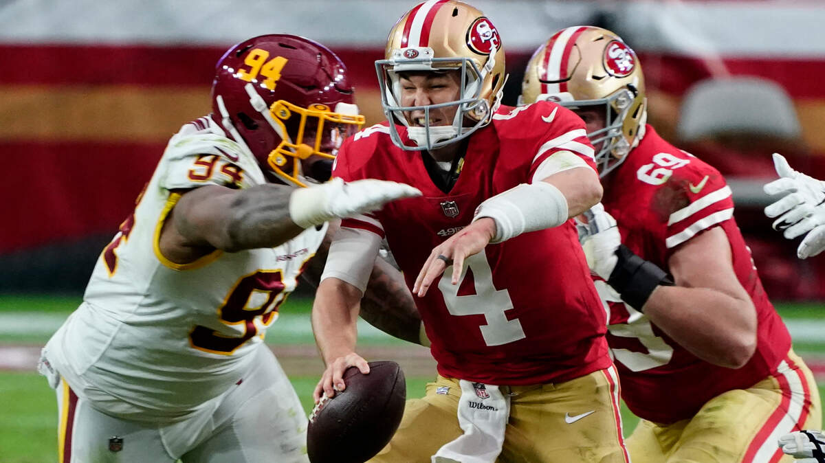 Washington defensive tackle Daron Payne sacks San Francisco quarterback Nick Mullens during Sunday’s game.