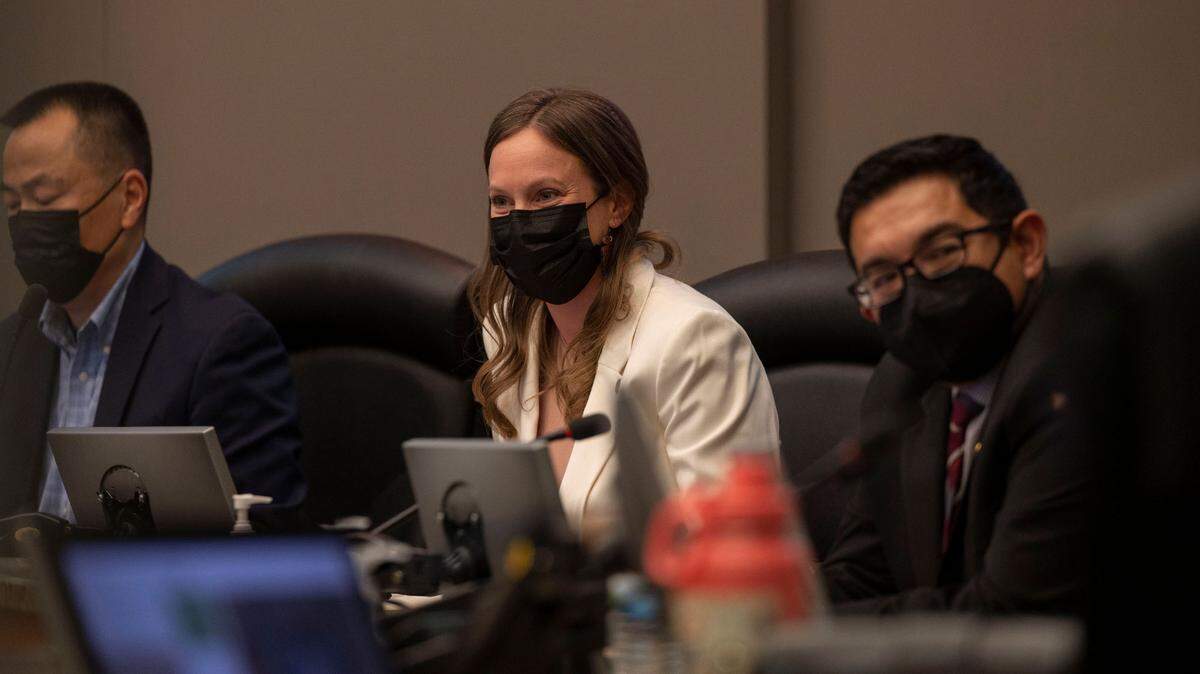 Caity Maple sits at the dais on her first day as a Sacramento City Council member after being sworn in along with other newly elected members Tuesday, Dec. 13, 2022.