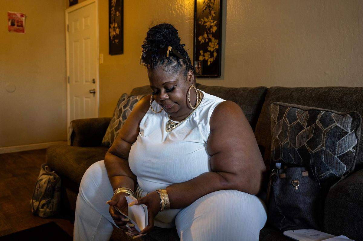 Sharaine Booker, mother of Jonas Calhoun, reflects on the life of her son on Aug. 9 in south Sacramento. Calhoun was shot and killed in a North Sacramento shooting earlier this month.