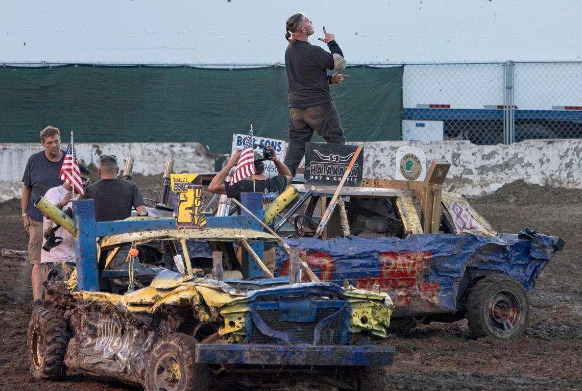 Ryan Chivers celebrates the demolition derby victory for a prize of $5,000 at Rodeo Arena inside the California State Fair on Saturday, July 22, 2023, in Sacramento.