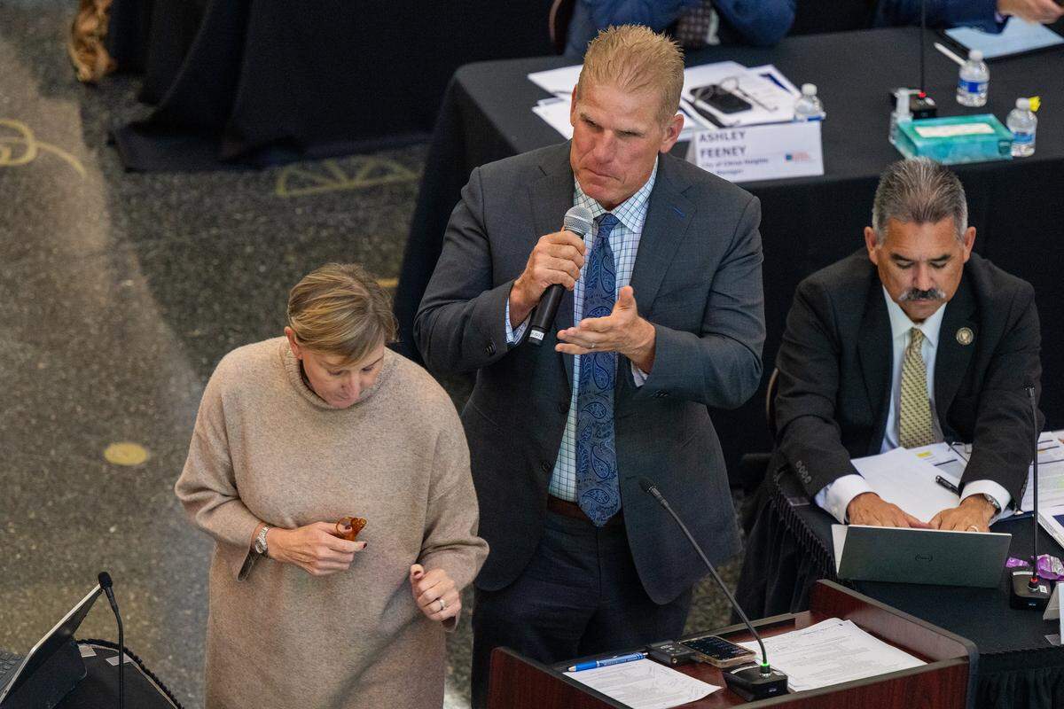 Matt Cate speaks alongside Darby Kernan, left, both of Mosaic Solutions & Advocacy, during a county-city meeting on homelessness at the Tsakopoulos Library Galleria in Sacramento on Tuesday.