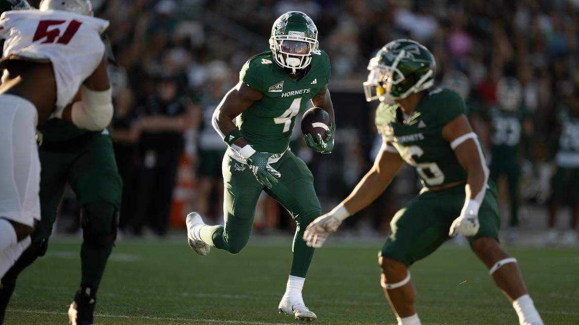 The Sacramento State Hornets running back Elijah Tau-Tolliver (4) runs for a touchdown in the first quarter against the Nicholls State Colonels in September at Sacramento State.