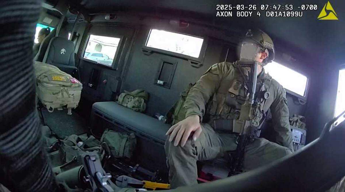 Marysville police officer Osmar Rodarte sits inside of an armored vehicle before executing a search warrant at a home in the 1700 block of Kestrel Court in Olivehurst. Rodarte, whose face was blurred in the provided image, was killed during the operation after exchanging gunfire with a suspect.