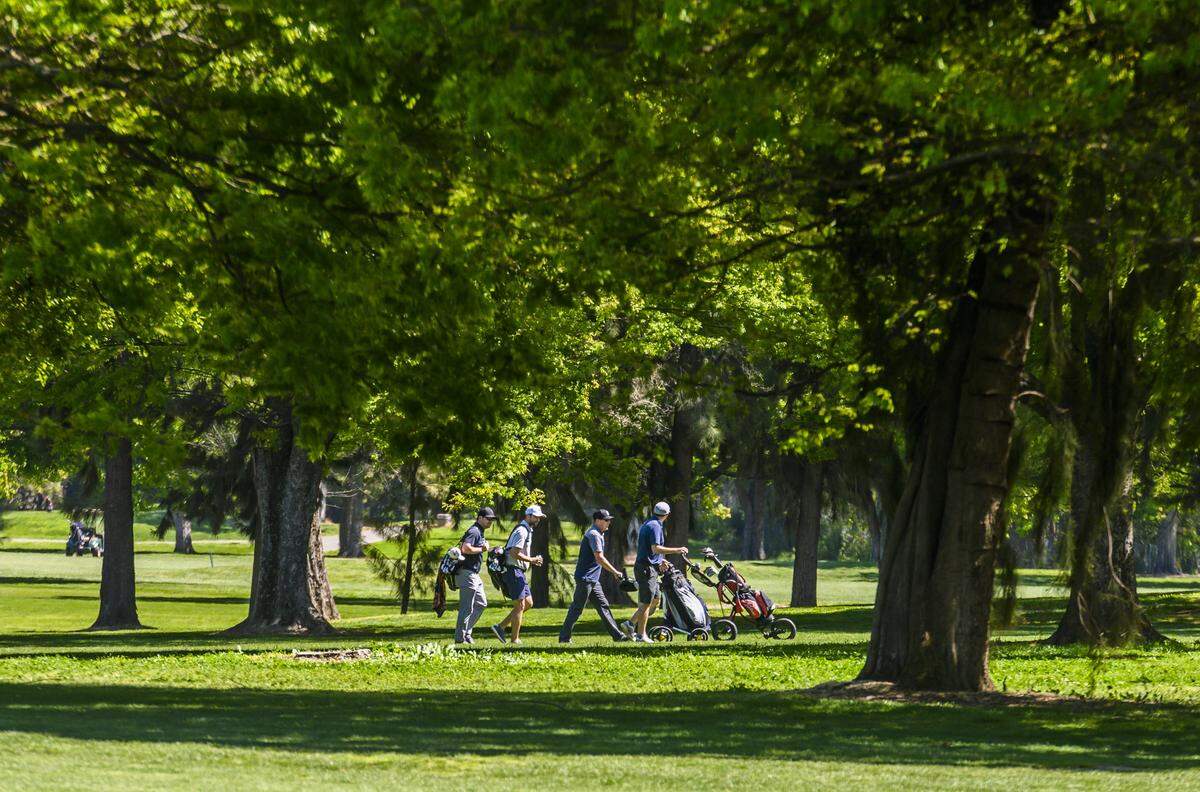 Players golf at Bing Mahoney Golf Course in Sacramento on Wednesday, April 1, 2020.