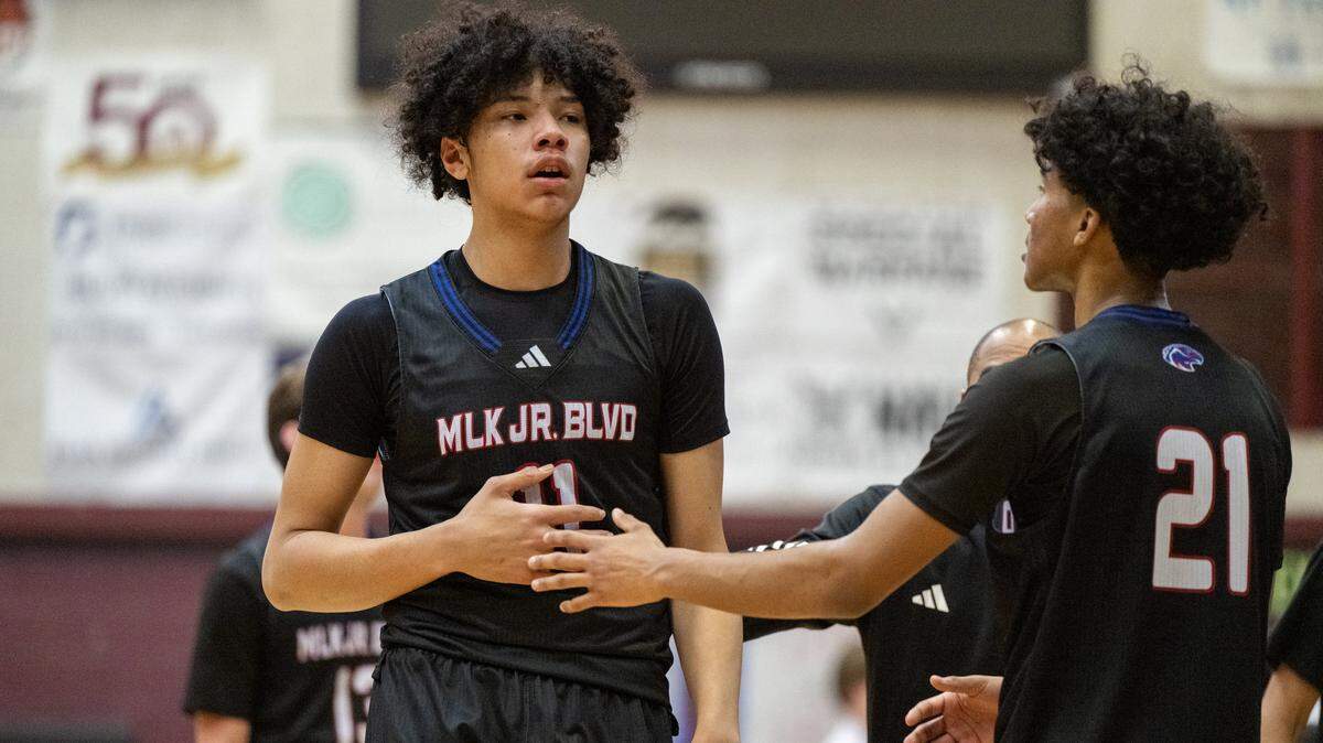 The Christian Brothers Falcons' Jaden DeJesus-Eves (11) is met by Isaac Fontaine V (21) after leaving the game in the first half against the Woodcreek Timberwolves on Thursday, Jan. 8, 2026 in Roseville.