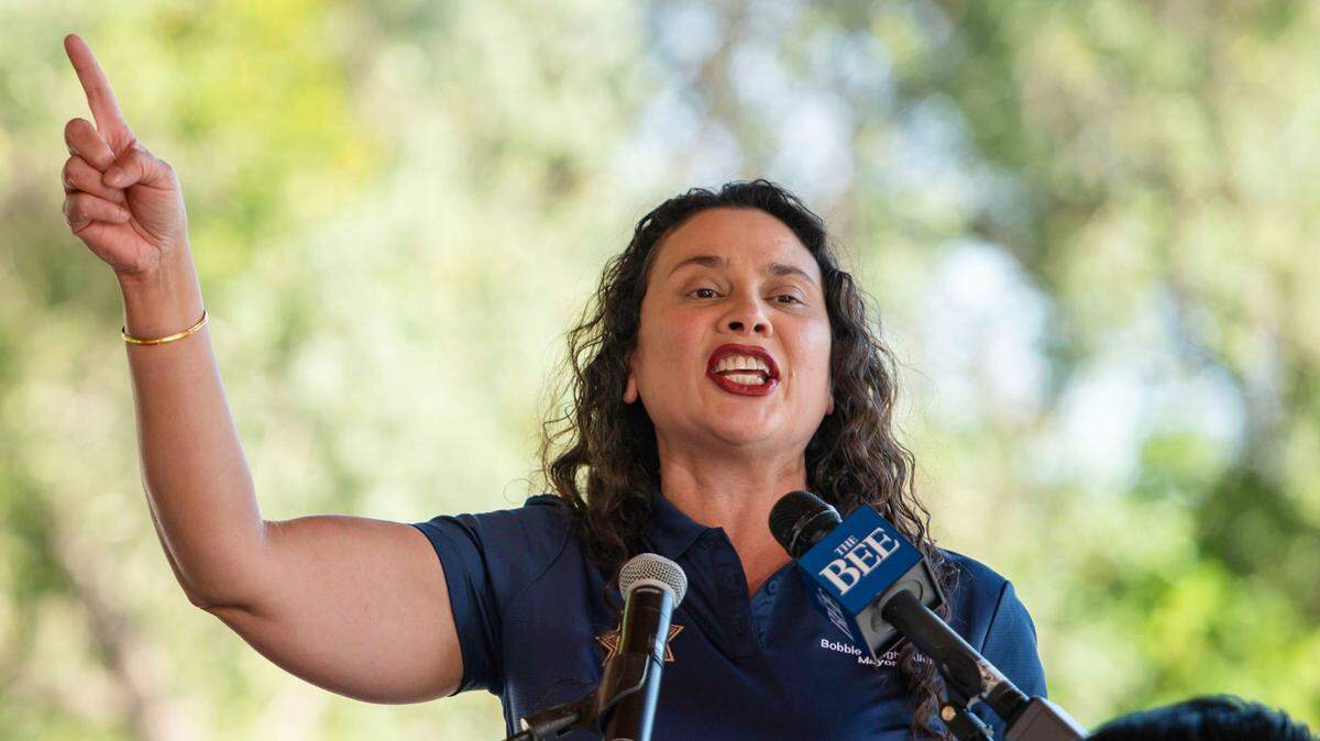Elk Grove Mayor Bobbie Singh-Allen speaks to the crowd during the celebration for Elk Grove boys basketball winning the CIF California Division II state championship Wednesday, April 6, 2022, at Old Town Plaza in Elk Grove.