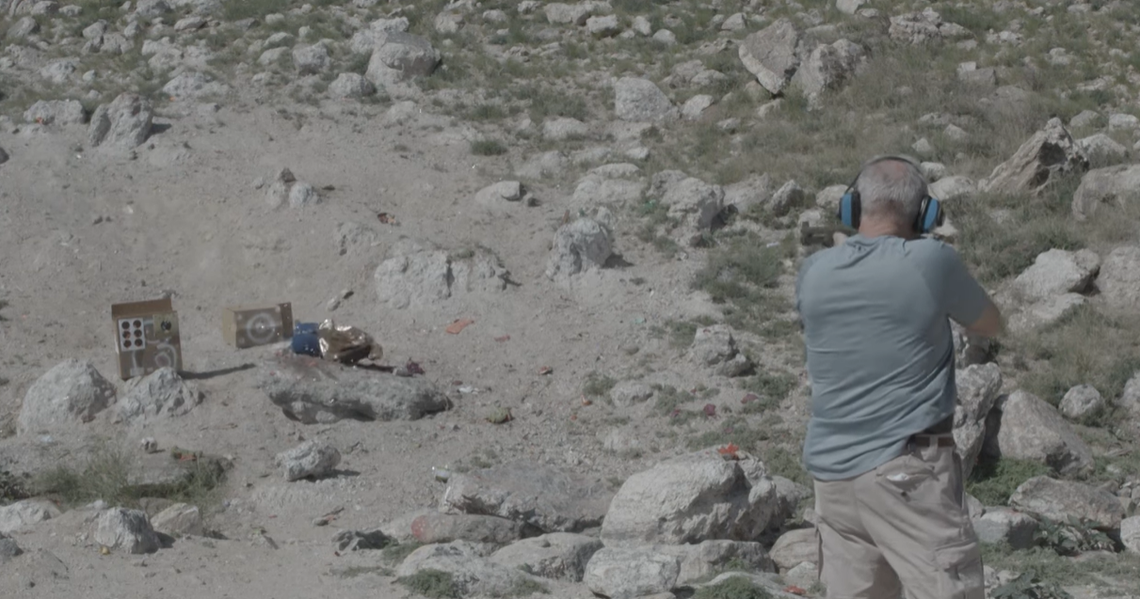 Man seen on video shooting incendiary rounds.