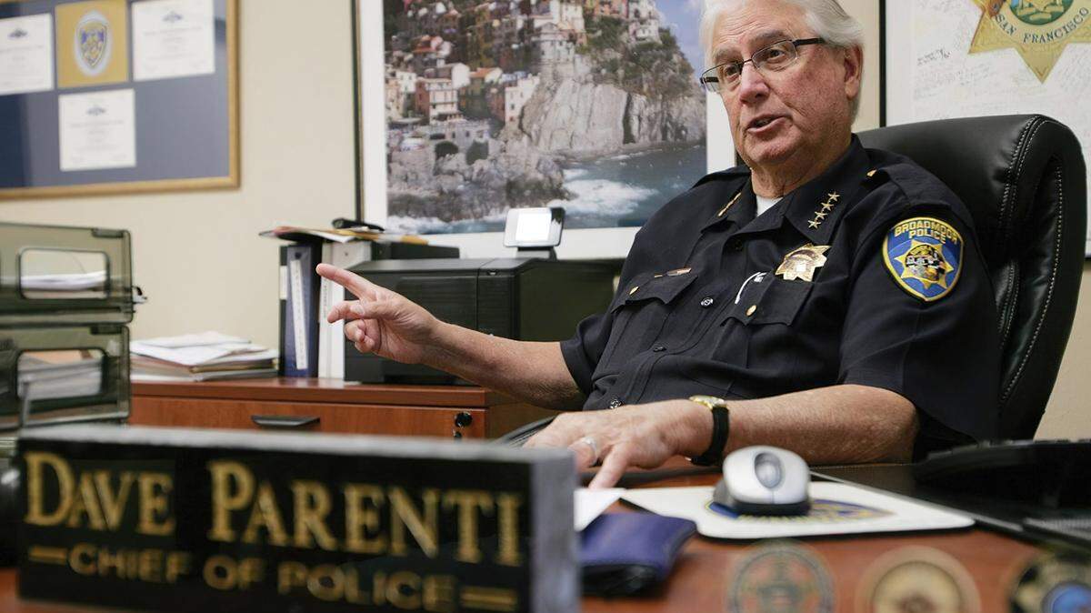 Broadmoor Police Chief Dave Parenti sits at his desk in 2013.
