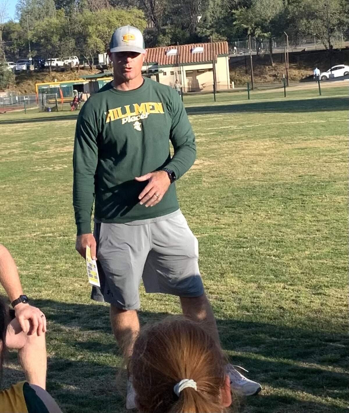Placer softball coach Dustin Smith also works as a police officer on the graveyard shift.