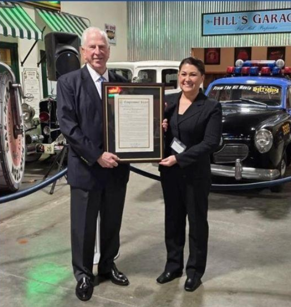 Deputy Sheriff Reiko Matsumura receives a 2025 Public Safety Hero of the Year award from U.S. Rep. Mike Thompson, D-St. Helena, in February. Matsumura retired in September amid investigations into fireworks stored on land she and her family owned.