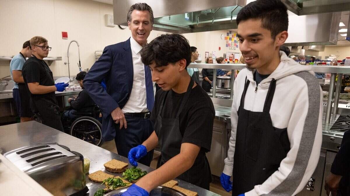 Gov. Gavin Newsom meets with culinary students in the Career Technical Education Pathways program at River City High School in West Sacramento on Thursday.