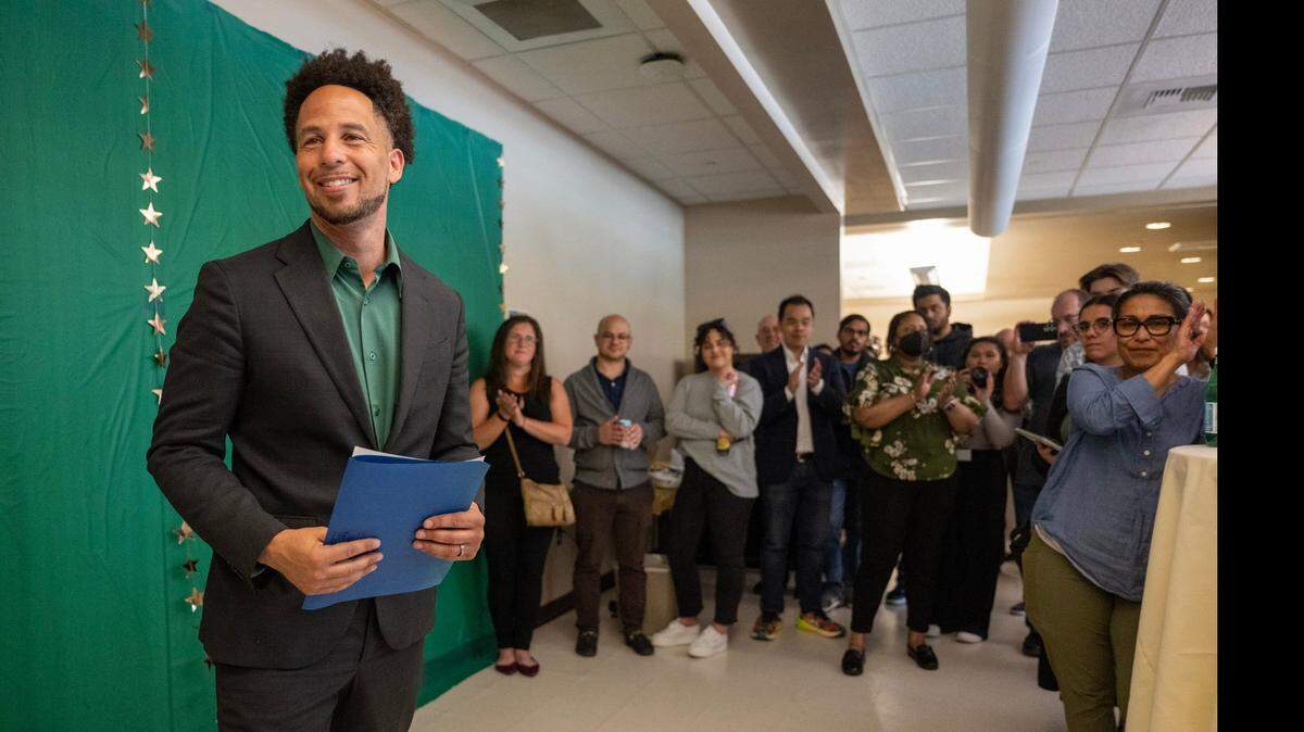 Sacramento State President Luke Wood helps dedicate the new Jewish Life and Resource Center with students and staff on Wednesday on campus.