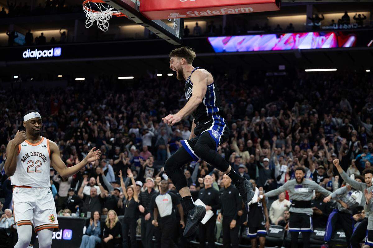 Third place, Sports Action Photo: Sacramento Kings Domantas Sabots reacts after scoring the winning basket against the San Antonio Spurs during a game at Golden 1 Center on Thursday, March 7, 2024 in Sacramento.