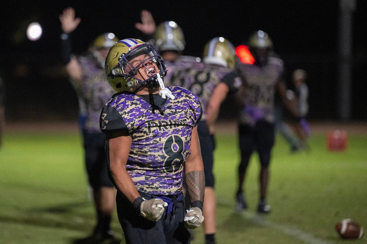 The Bradshaw Christian Pride’s Mateo Mojica (8) reacts after scoring a touchdown in the final second of the fourth quarter in the game against the Sutter Huskies on Sept. 13 at Bradshaw Christian High School.