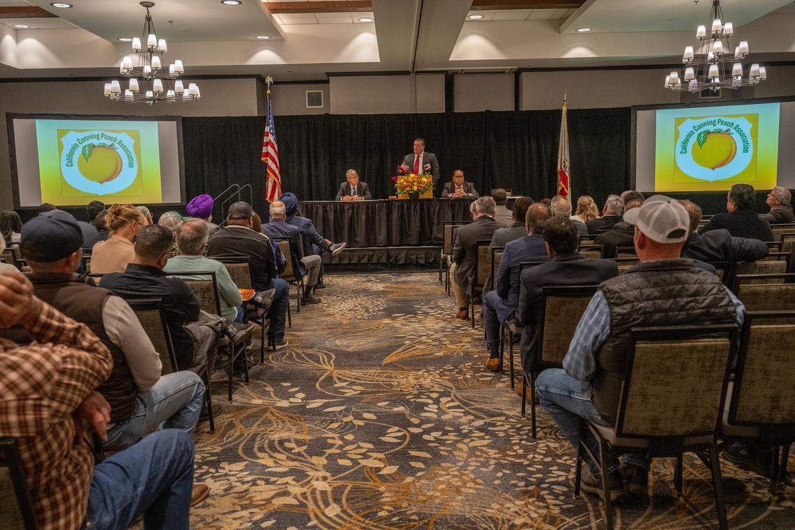 Kevin Ralph, California state president of AgWest Farm Credit, speaks to a packed room at the annual California Canning Peach Association meeting in Sacramento on Feb. 4.