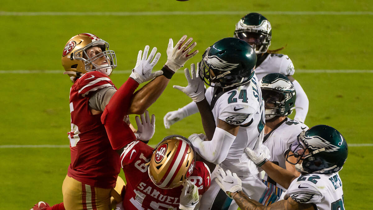 San Francisco 49ers tight end George Kittle (85) and San Francisco 49ers wide receiver Deebo Samuel (19) reach for a Hail Mary pass by San Francisco 49ers quarterback C.J. Beathard (3) on the last play of the game against the Philadelphia Eagles at Levi’s Stadium on Sunday, Oct. 4, 2020 in Santa Clara.
