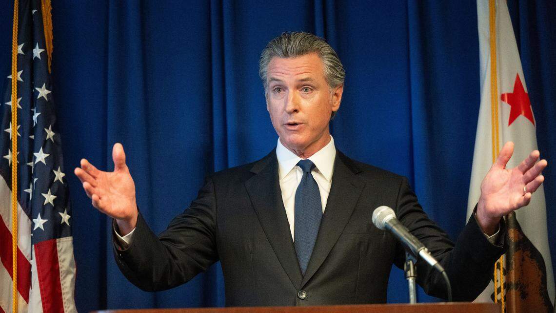Gov. Gavin Newsom answers questions from the media Wednesday, Sept. 4, 2024, at a California Department of Justice press conference in Sacramento.
