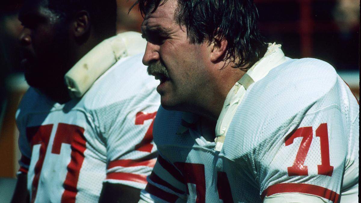 LOS ANGELES - OCTOBER 8:  Tackle Keith Fahnhorst #71 of the San Francisco 49ers watches from the sideline against the Los Angeles Rams at the Los Angeles Memorial Coliseum on October 8, 1978 in Los Angeles, California. The Rams defeated the 49ers 27-10. (AP Photo/NFL Photos)