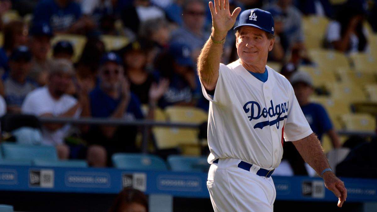 Former Los Angeles Dodgers first baseman Steve Garvey takes the field for an “Old Timers” game before the Dodgers played the Cincinnati Reds on June 10, 2017, at Dodger Stadium.