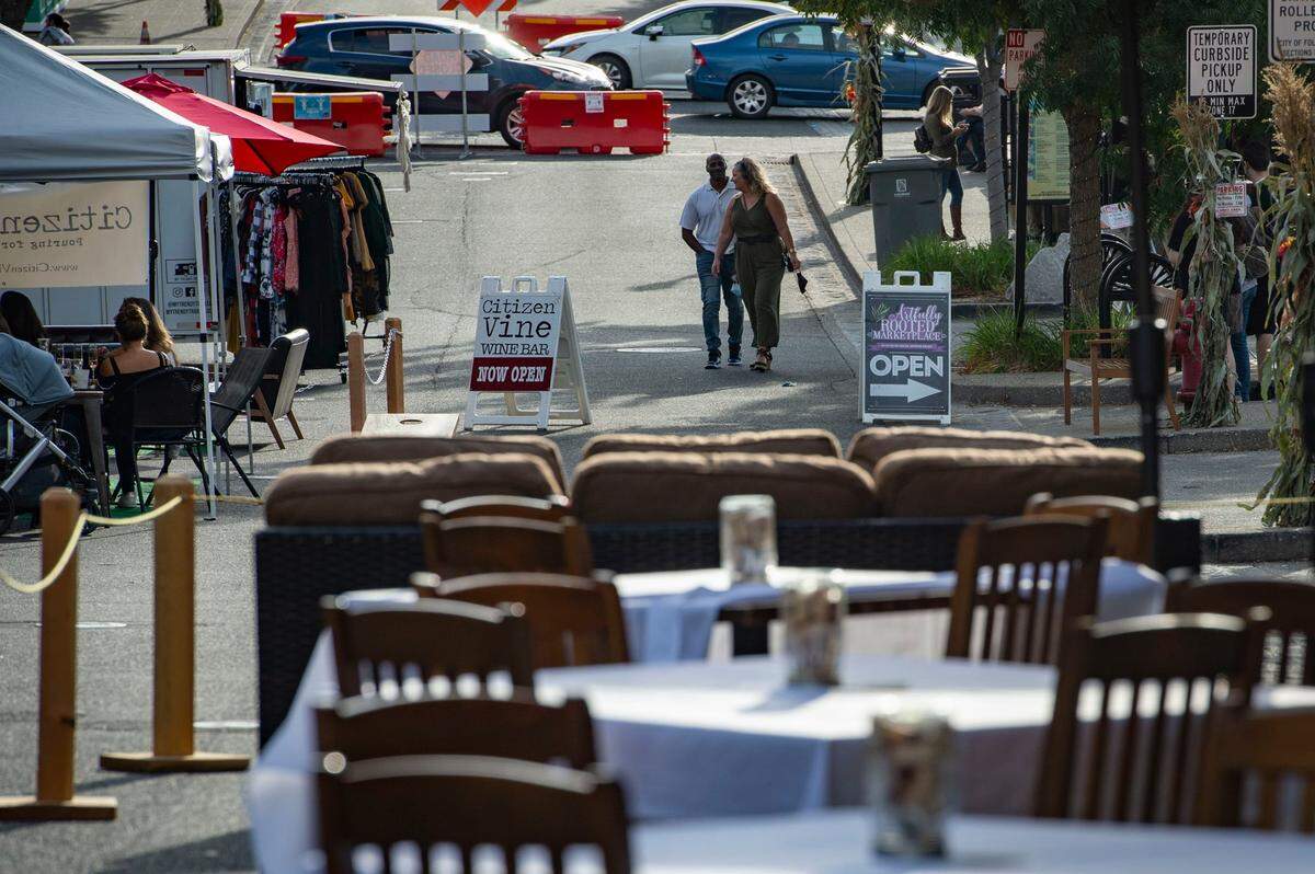 Empty tables wait customers in front of Sutter Street Steakhouse in Folsom on Oct. 10, 2020.