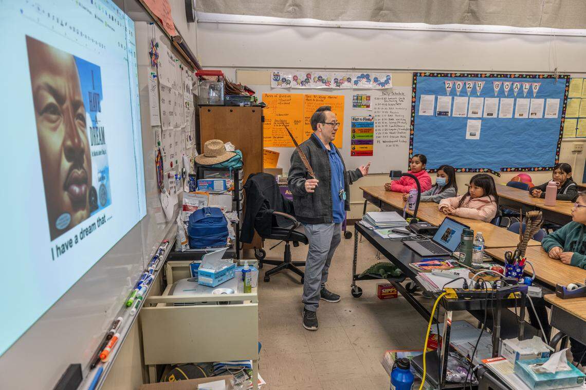 Ethel I. Baker Elementary fourth grade teacher Souchoy Saechou talks to his students at the start of class as part of the school’s integrated Center of Wellness program on Thursday, Jan. 18, 2024.