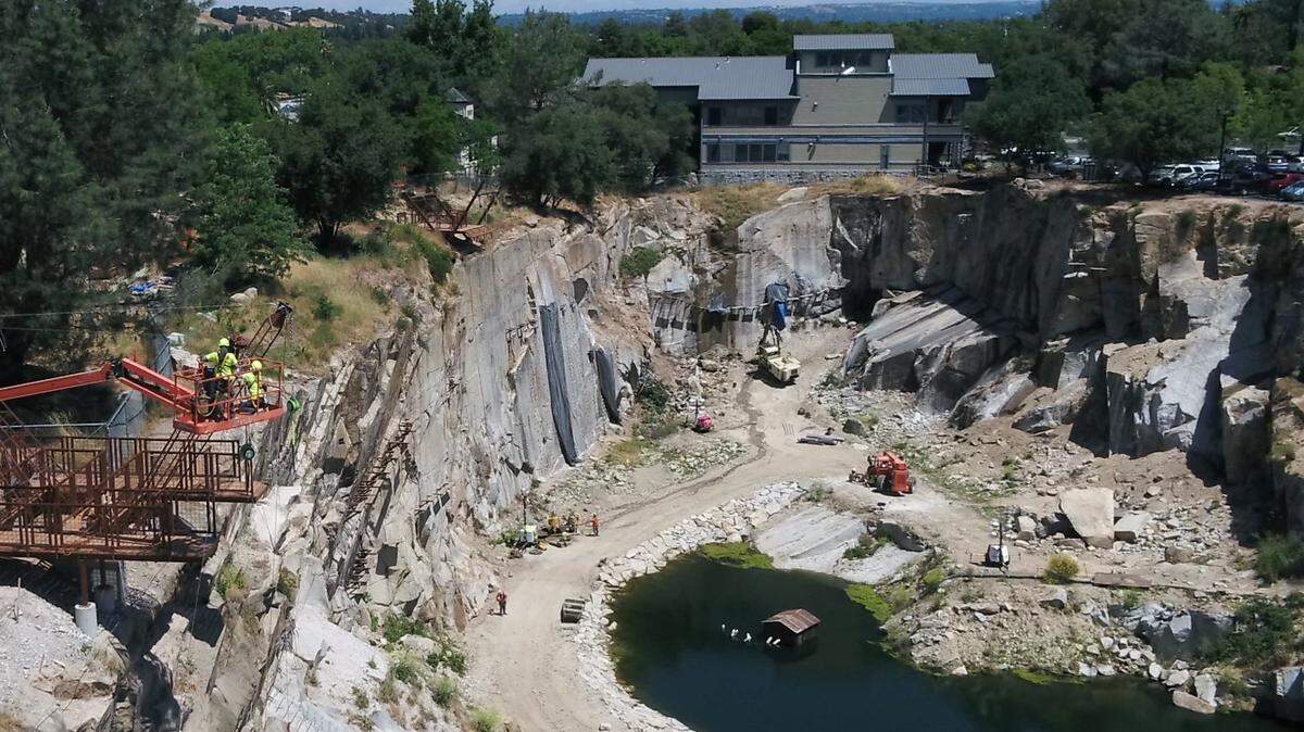 Workers assemble features at Quarry Park Adventures, a new theme park in Rocklin that is scheduled to open Oct. 13 and is one major issue facing the City Council.