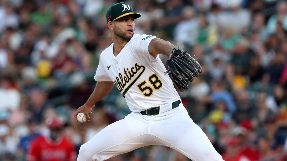 Aug 16, 2025; West Sacramento, California, USA; Athletics starting pitcher Luis Morales (58) throws a pitch against the Los Angeles Angels during the second inning at Sutter Health Park. Mandatory Credit: Dennis Lee-Imagn Images