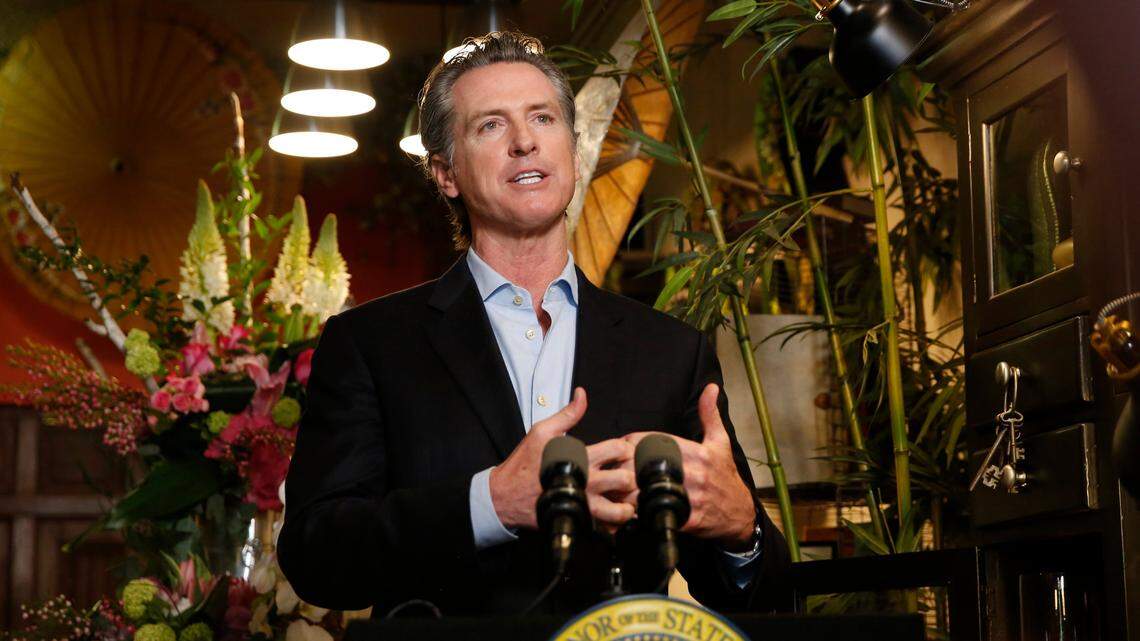 Gov. Gavin Newsom discusses the reopening of businesses during a news conference at Twiggs Floral Design Gallery in East Sacramento on Friday, May 8, 2020. Newsom spoke about his administration’s guidance allowing retailers, including flower shops, to begin opening Friday with restrictions like curbside pickup.